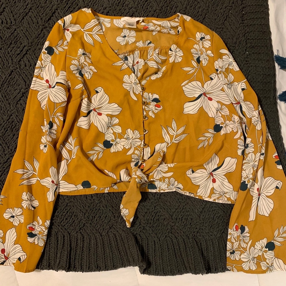 Floral button up blouse.